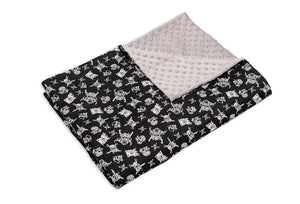 skull print and light grey weighted blanket