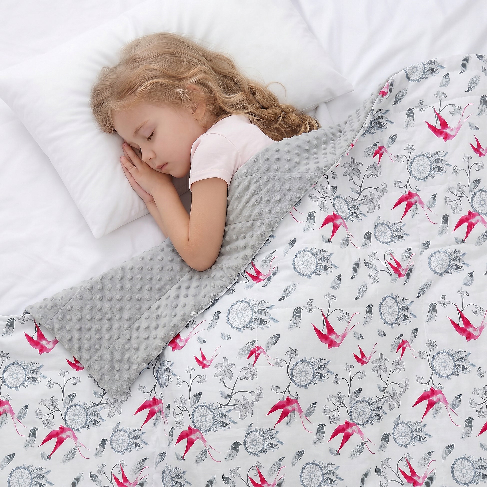 a child sleeping under dreamcatchers weighted blanket